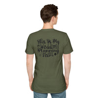 Back view of man wearing olive green eco-friendly wedding planning shirt with black script text