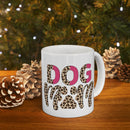White eco friendly ceramic dog mom mug with leopard print DOG mom design on wooden table with pine cones and holiday lights
