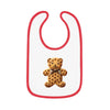 Printify eco-friendly baby bib with red trim and cute teddy bear cookie design