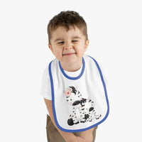 Toddler wearing Printify eco-friendly baby bib with cute zebra design and blue trim