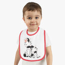 Toddler wearing Printify eco-friendly baby bib with cute zebra design and red trim