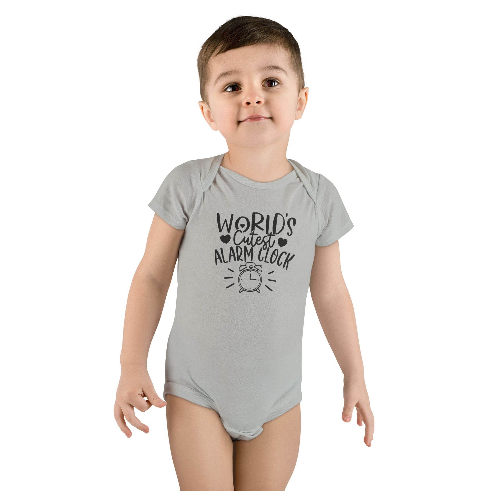 Toddler wearing Printify eco-friendly baby onesie with Worlds Cutest Alarm Clock text design