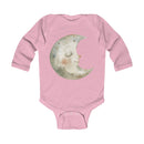 Pink eco-friendly baby onesie with long sleeves and a smiling moon graphic on front
