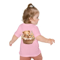 Toddler wearing pink eco-friendly baby t-shirt with teddy bear in basket floral design on back