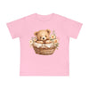 Pink eco-friendly baby t-shirt with teddy bear in basket and floral design by Printify