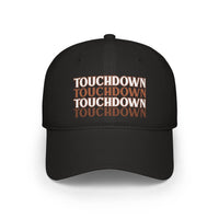 Black eco-friendly baseball cap with repeated touchdown text design printed on front by Printify