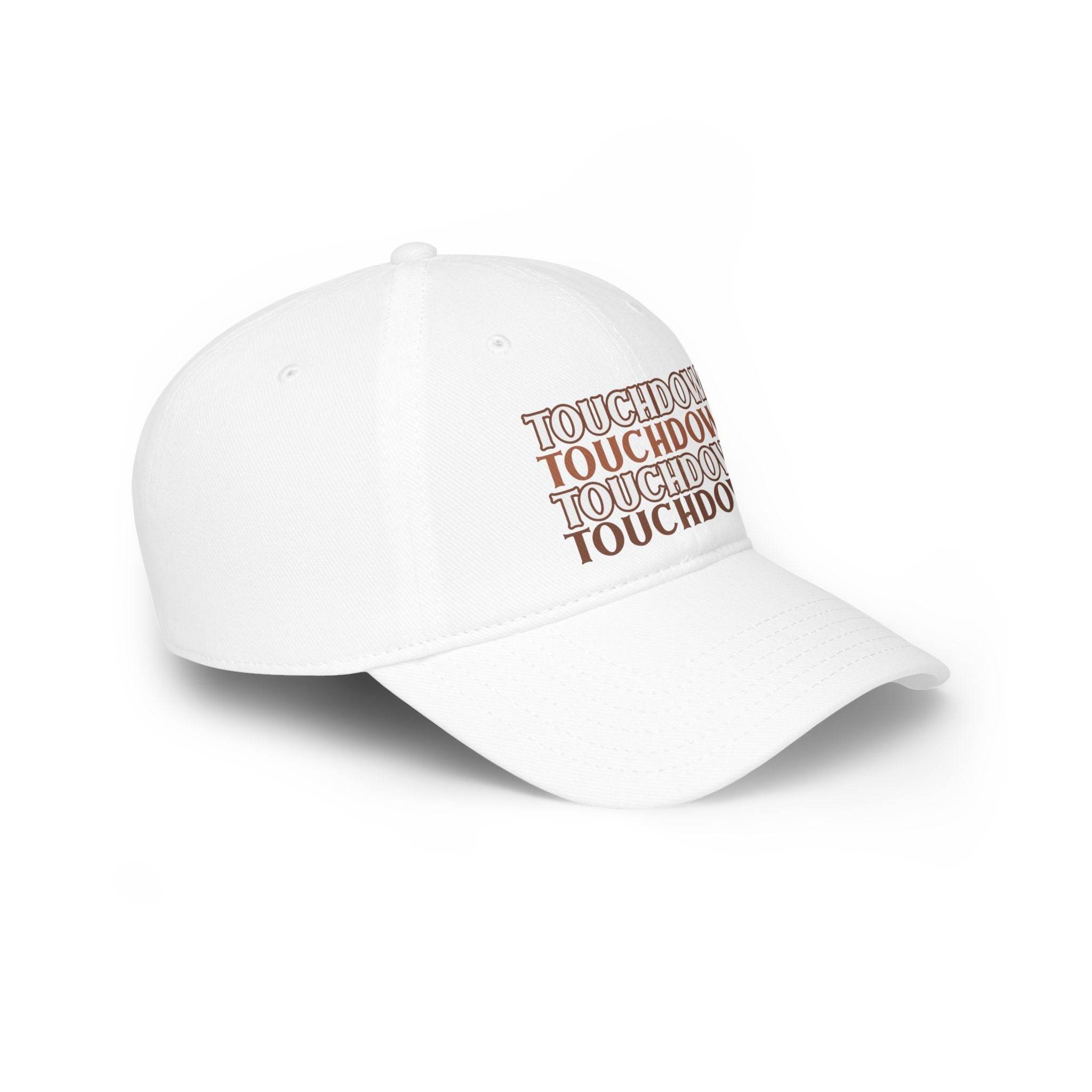 White eco-friendly baseball cap from Printify with multiple brown touchdown text designs