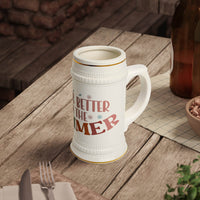 Printify white ceramic eco-friendly beer stein with gold accents and decorative text on wooden table
