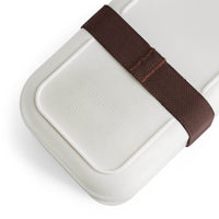 White eco-friendly bento lunch box with brown elastic strap for secure closure by Printify