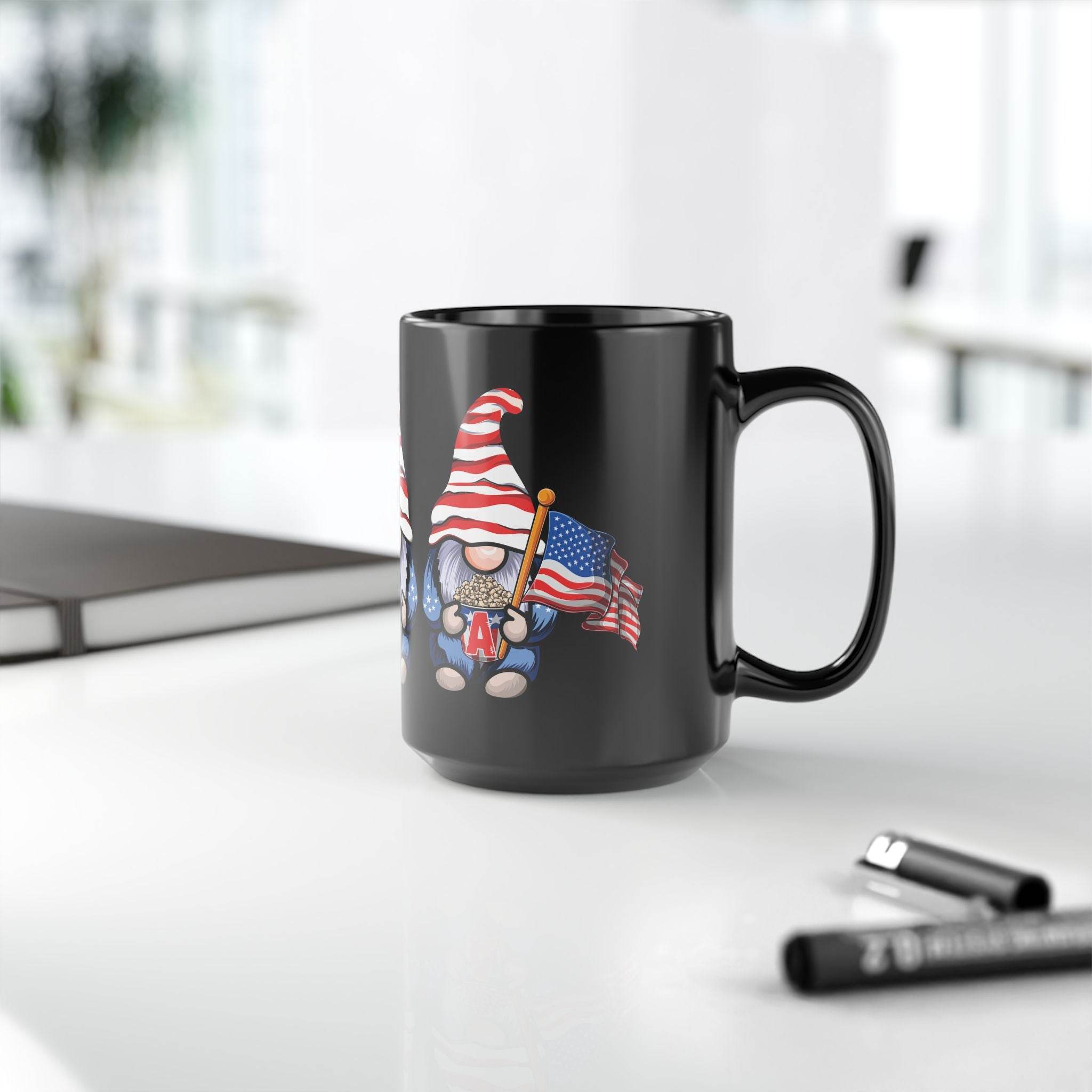 Printify eco-friendly black mug with patriotic gnome holding American flag on office desk