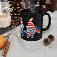 Printify eco-friendly black mug with patriotic gnome holding an American flag on a cozy holiday table