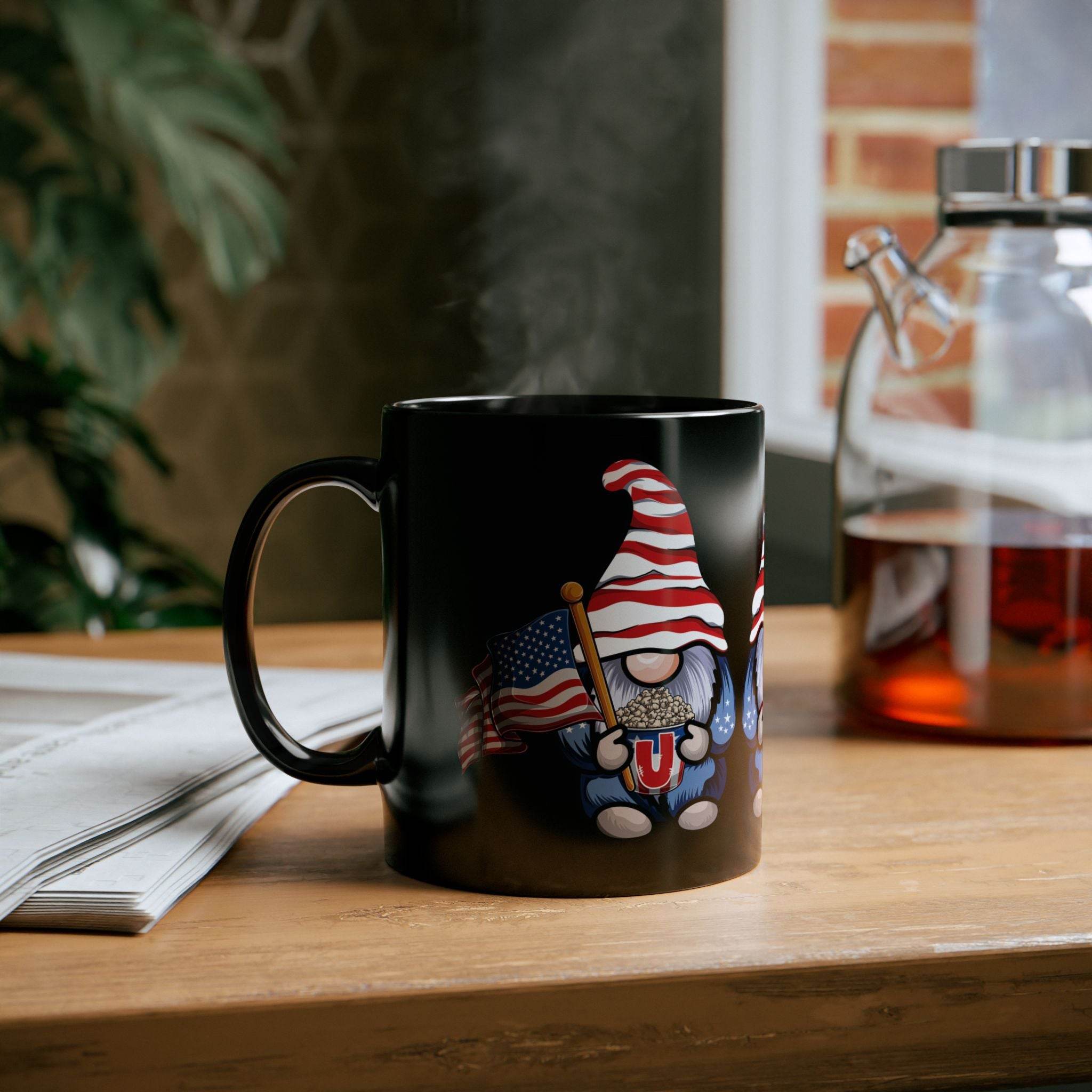 Printify eco-friendly black mug with a patriotic gnome holding an American flag on wooden table