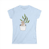 Printify eco-friendly cat lover t-shirt with cat sitting in a potted plant design on light blue fabric