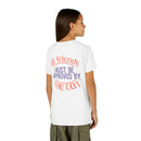 Printify white eco-friendly cat t-shirt with All friends must be approved by the cat text on back worn by child