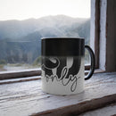 Printify eco-friendly color changing mug with mustache design sitting on wooden windowsill with steam rising