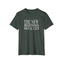 Printify eco-friendly fashion tee in dark green with The New Beginnings Social Club white text design