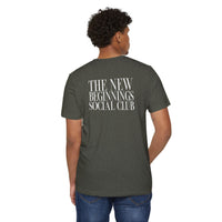 Printify eco-friendly fashion tee in dark gray with The New Beginnings Social Club text on back