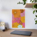Printify eco-friendly flower posters featuring colorful floral design in warm tones displayed on a white wall