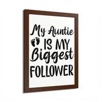 Eco-friendly framed poster by Printify with My Auntie Is My Biggest Follower quote in brown frame