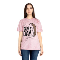 Woman wearing a pink eco-friendly game day t-shirt with football graphic and text design