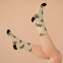 Printify eco-friendly ginger snaps socks with gingerbread man design and black heels and toes