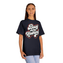 Printify eco-friendly graphic tee in black with busy doing nothing slogan worn by woman