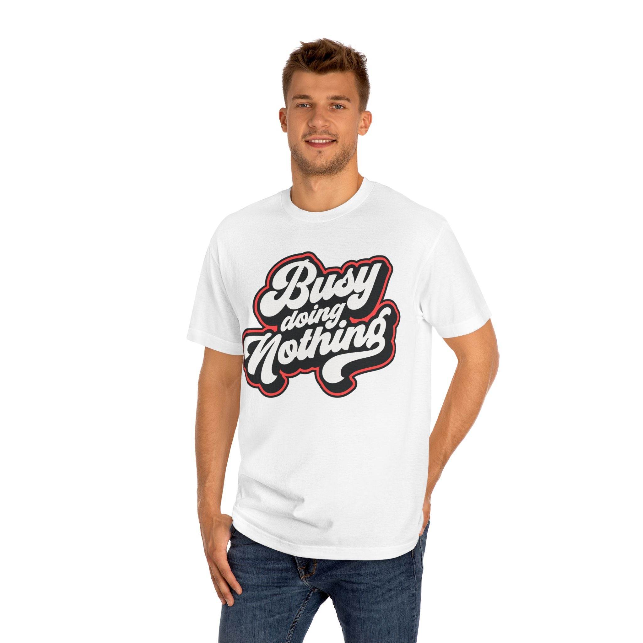 Printify white eco-friendly graphic tee with Busy Doing Nothing text worn by smiling man