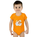 Baby wearing orange eco-friendly infant clothing onesie with cute animal print from Printify