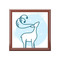 Eco-friendly jewelry box design featuring a stylized deer silhouette against a blue background