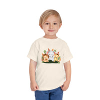 Child wearing an eco-friendly kids t-shirt with cute jungle animal print by Printify