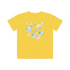 Yellow eco-friendly kids t-shirt by Printify with colorful bubble design on the back