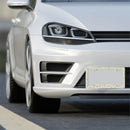 White car front with eco-friendly license plate frame featuring a star pattern on road