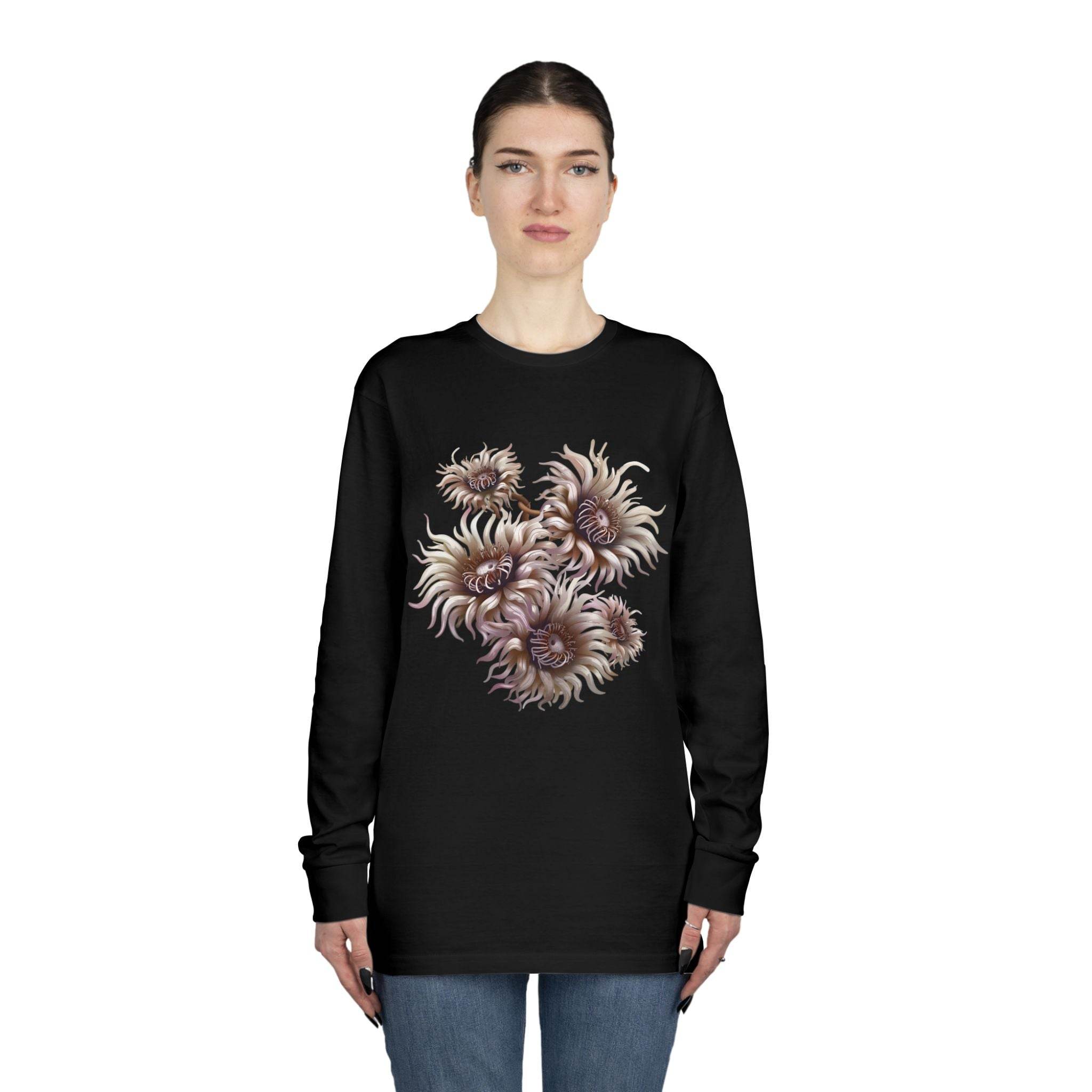 Printify eco-friendly long sleeve shirt in black with floral graphic worn by woman