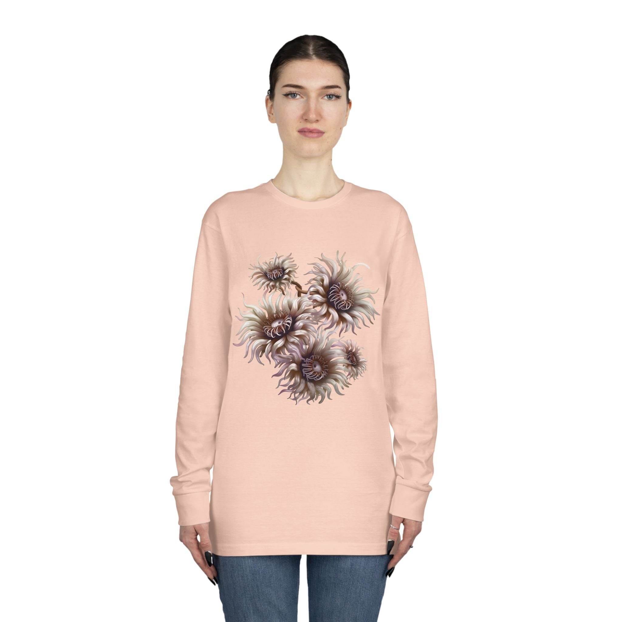 Printify eco-friendly long sleeve shirt in light pink with floral abstract design worn by model