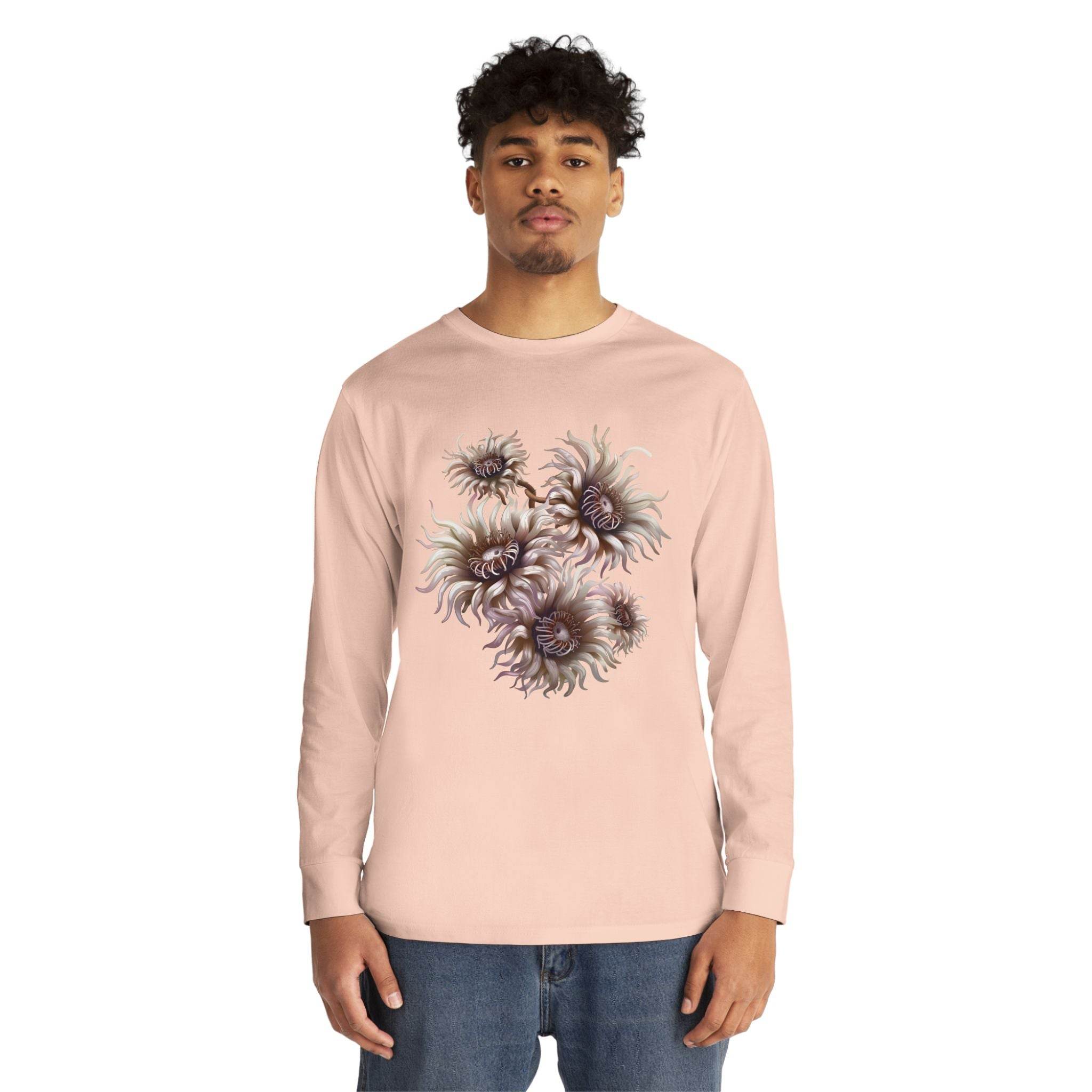 Printify eco-friendly long sleeve shirt in light pink with floral design worn by male model