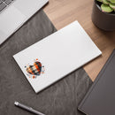 Printify eco-friendly note pads with heart design placed on a desk near laptop and plant