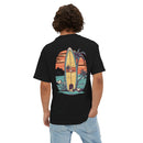 Printify eco-friendly oversized t-shirt in black with surfboard and tropical sunset design on the back