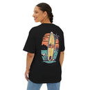 Printify eco-friendly oversized t-shirt in black with colorful surfboard and palm tree graphic on back