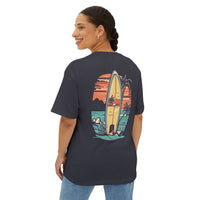 Printify eco-friendly oversized t-shirt in black with colorful surfboard and sunset graphic on back
