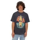 Printify eco-friendly oversized t-shirt with surfboard and sunset graphic worn by young man