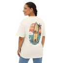 Eco-friendly oversized t-shirt from Printify featuring a surfboard and tropical beach graphic on the back