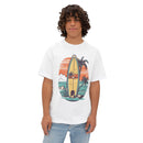 Printify eco-friendly oversized t-shirt white with colorful surfboard and beach graphic worn by male model