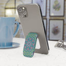 Printify eco-friendly phone grip with colorful mandala design attached to a silver smartphone on a white table