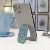 Printify eco-friendly phone grip with colorful mandala design attached to a silver smartphone on a white table