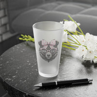 Printify eco-friendly pint glass with frosted design and Mama Bear graphic on black table