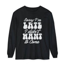 Black Printify eco-friendly sarcastic long sleeve shirt with white apology graphic text