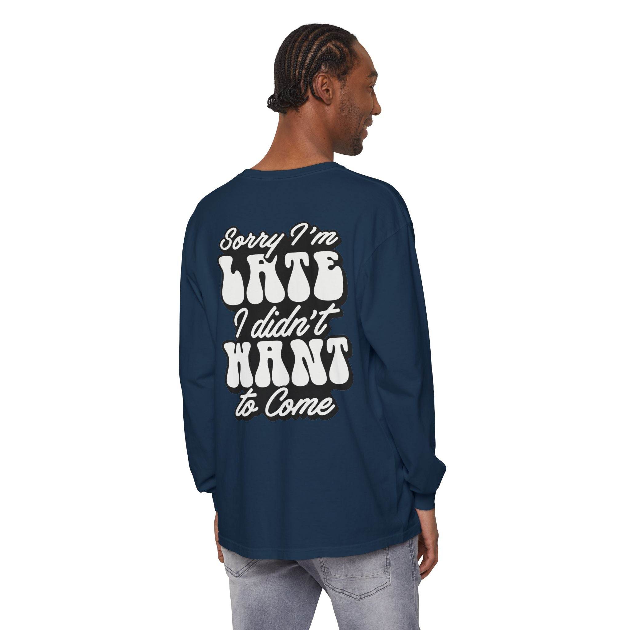 Man wearing a navy blue eco-friendly sarcastic long sleeve shirt with white bold text on the back