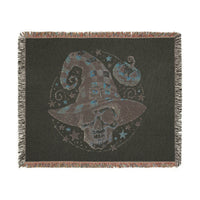 Printify eco-friendly skull blanket with a spooky skull wearing a checkered witch hat and pumpkin design