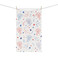 Printify eco-friendly tea towels with red and blue fireworks and star pattern hanging on a clothesline