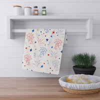 Eco-friendly tea towels featuring colorful fireworks design, perfect for kitchen decor
